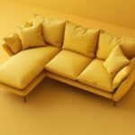 A modern yellow sectional sofa with plush cushions is positioned against a matching yellow wall, creating a vibrant and cozy atmosphere.